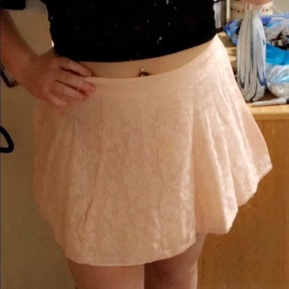 Light pink lace mini skirt